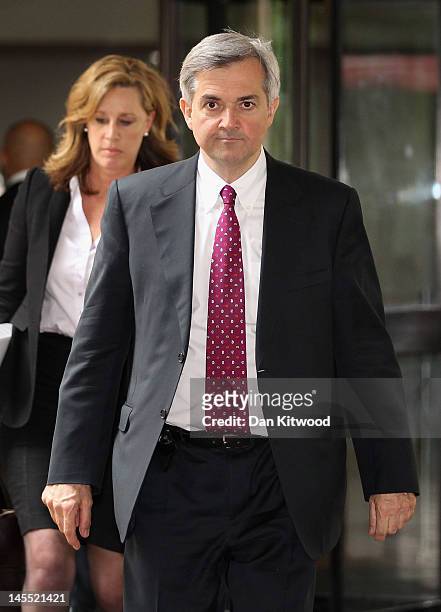 Former Cabinet Minister Chris Huhne leaves Southwark Crown Court after a pre-trial hearing on June 1, 2012 in London, England. Mr Huhne and his...