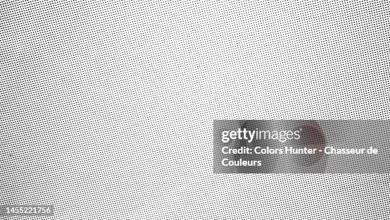 Very close-up of a poster in white and grey tones printed using the offset technique in Paris Very close-up of a poster in white and grey tones printed using the offset technique in Paris