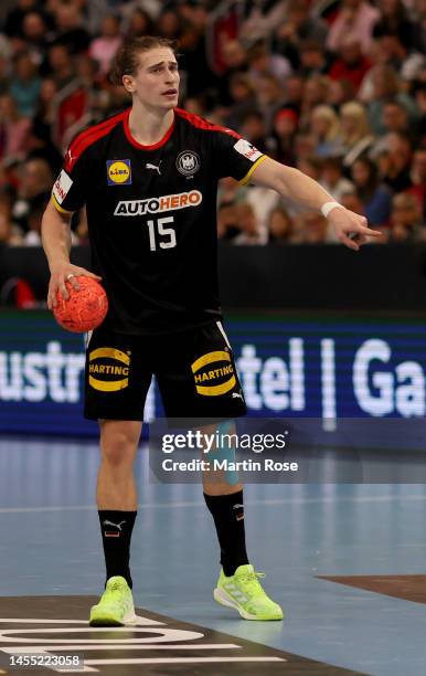 Juri Knorr of Germany controls the ball during the handball international friendly match between Germany and Iceland at ZAG-Arena on January 08, 2023...