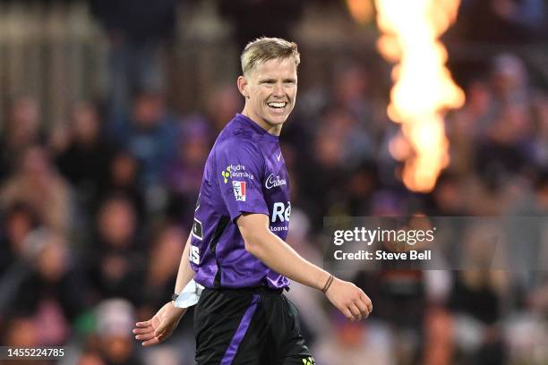 Nathan Ellis of the Hurricanes celebrates the wicket of Nick Larkin of the Stars during the Men's Big Bash League match between the Hobart Hurricanes...