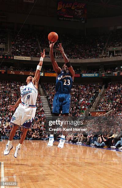 Michael Jordan of the Washington Wizards shoots over John Starks of the Utah Jazz at the Delta Center in Salt Lake City, Utah. DIGITAL IMAGE NOTE TO...