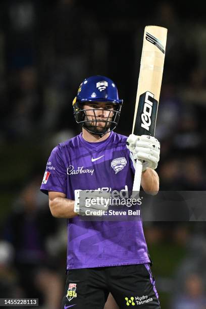 Caleb Jewell of the Hurricanes celebrates scoring a half century during the Men's Big Bash League match between the Hobart Hurricanes and the...