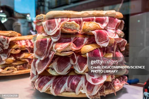 pile of jamon serrano sandwiches - bocata stock pictures, royalty-free photos & images