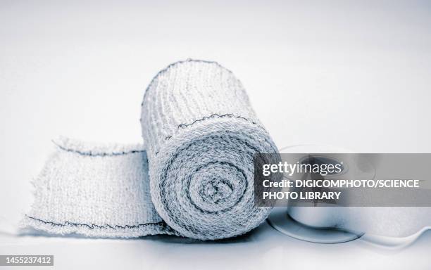 bandage roll and plaster - plastering stock pictures, royalty-free photos & images