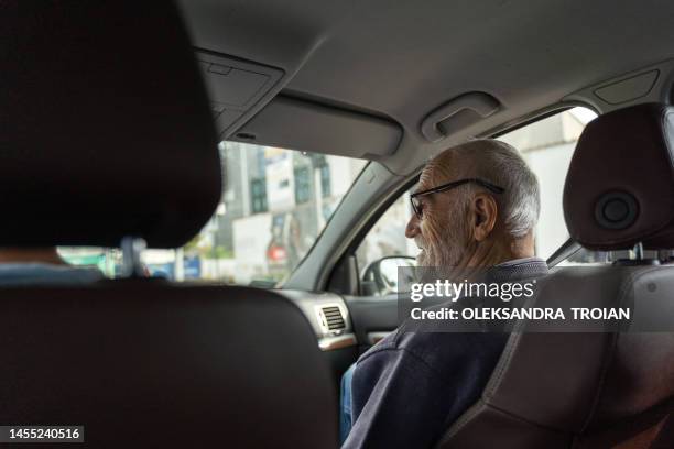 elderly  man in car, senior travel concept - gray belt stock pictures, royalty-free photos & images