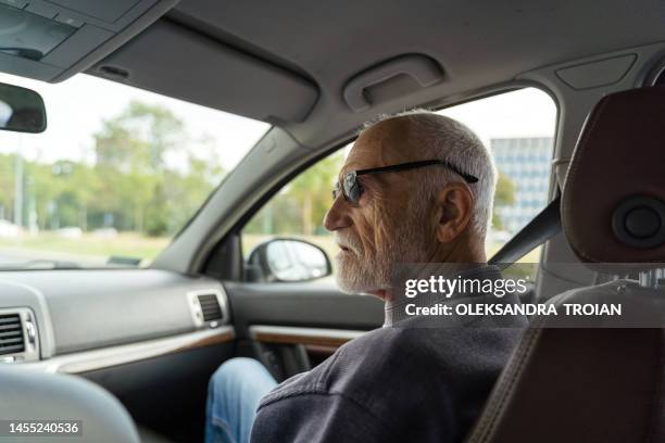 elderly  man in car, senior travel concept - gray belt stock pictures, royalty-free photos & images