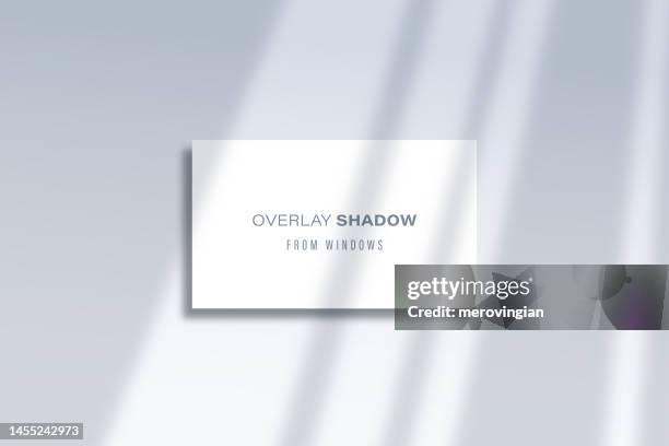 shadow overlay effect template. transparent soft light and shadows from window. mockup of window shade over wall hanging frame - shade stock illustrations