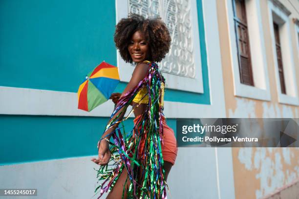 beautiful afro woman dancing frevo - fiesta stock pictures, royalty-free photos & images