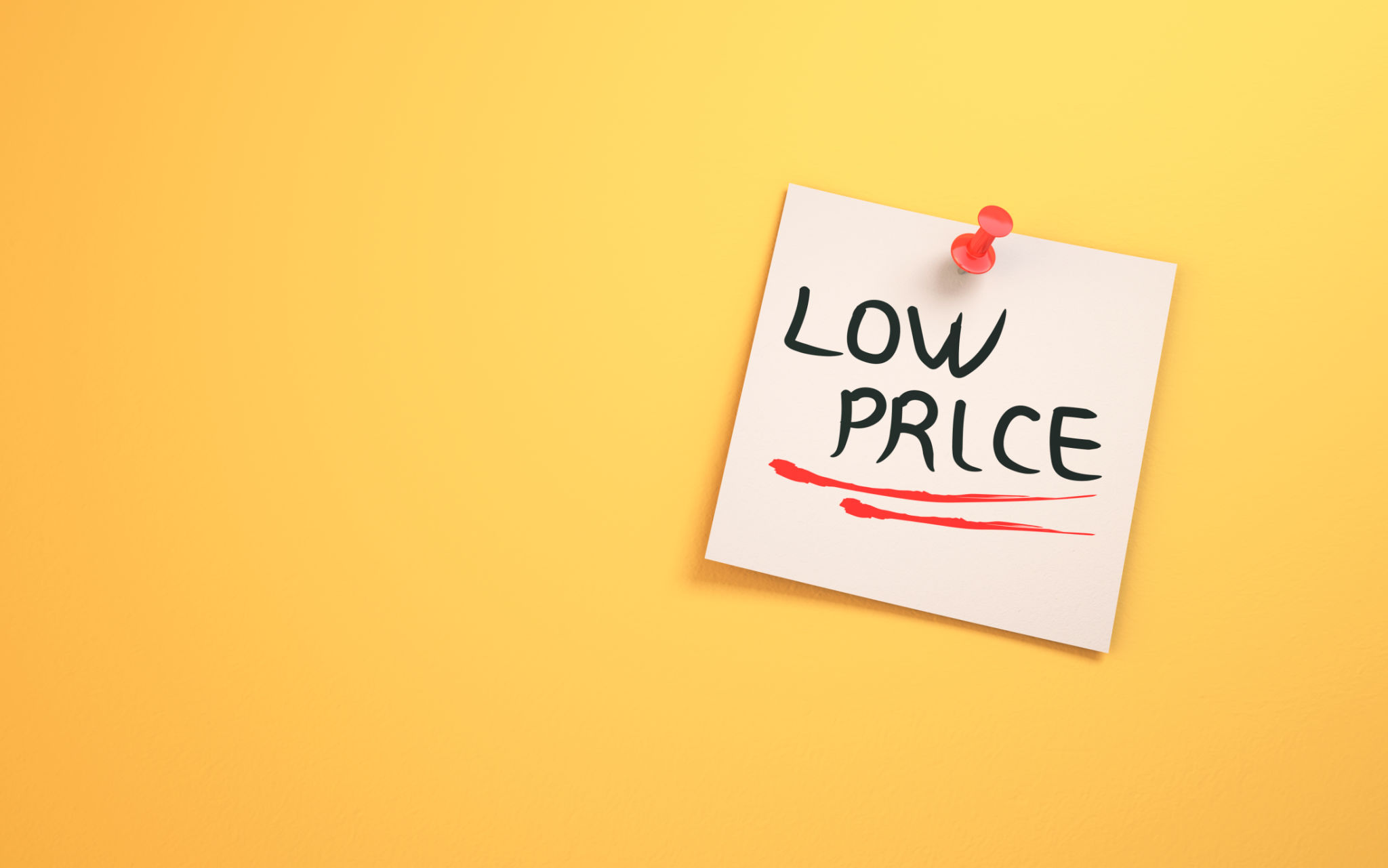 Low Price Text Written on Note Paper Sitting on Yellow Background Low Price Text Written on Note Paper Sitting on Yellow Background