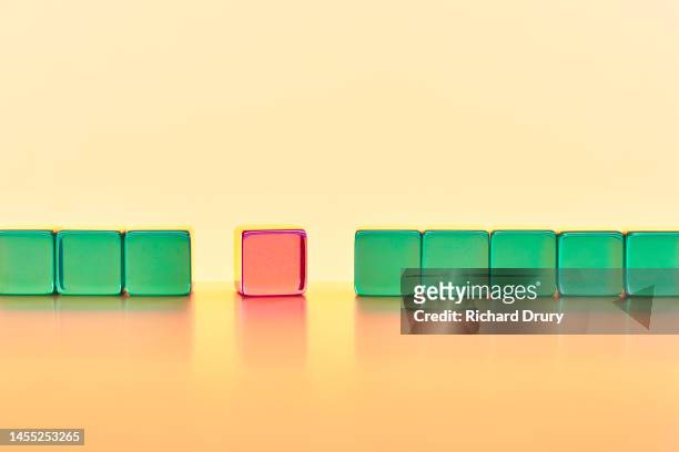 conceptual image of transparent coloured cubes - unusual imagens e fotografias de stock