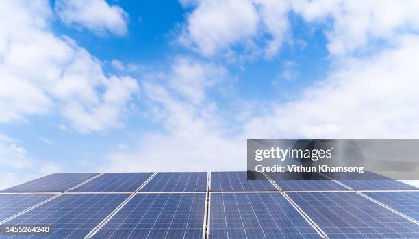 solar panels for green energy and sky - panel de control fotografías e imágenes de stock