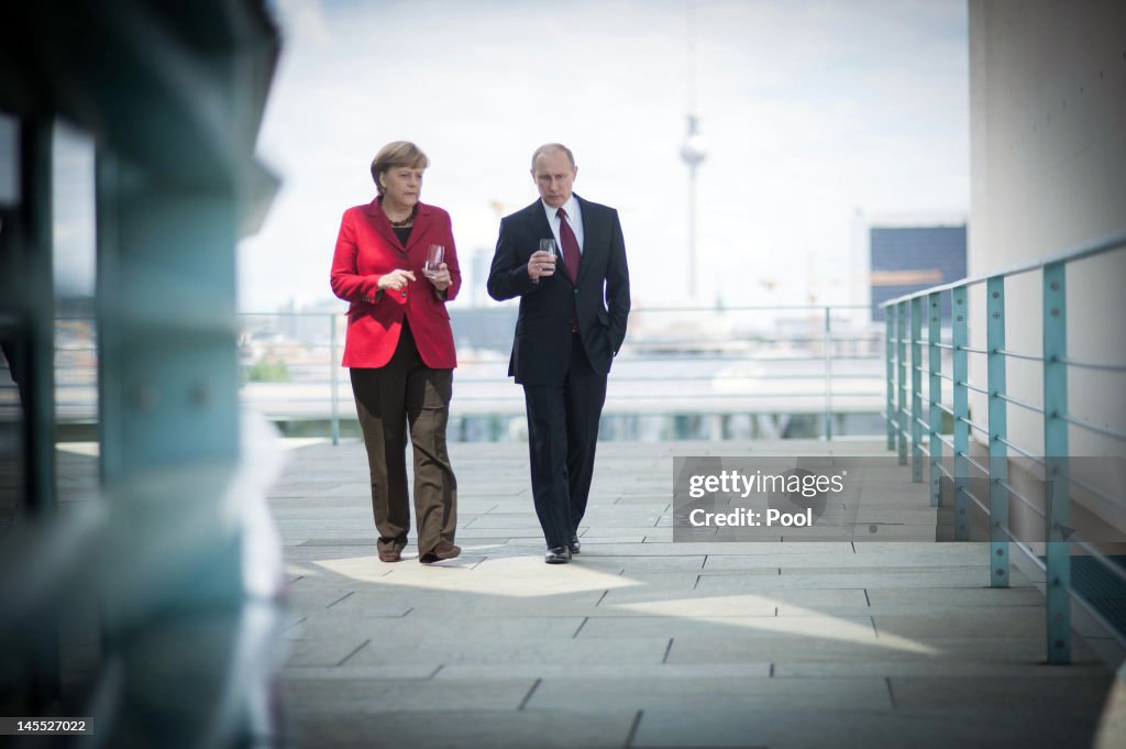 Putin Meets With Merkel In Berlin