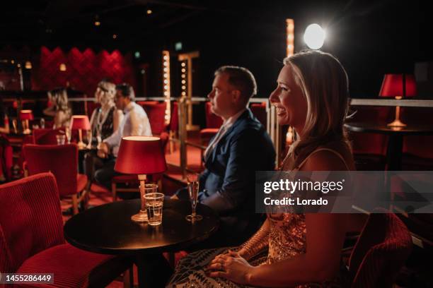 theatre cabaret audience enjoying a show - celebrity cabaret stock pictures, royalty-free photos & images