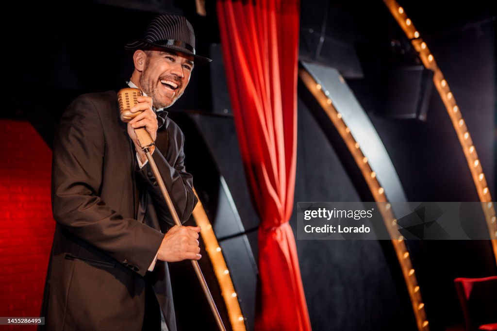 Handsome male singer on stage