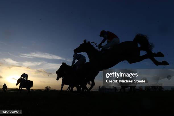 The field clear the first fence in the Portman Cup Saturday 21st January Mares' Handicap Hurdle Race at Taunton Racecourse on January 09, 2023 in...