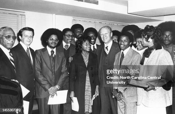 Portrait of President Gerald Ford standing with university students at North Carolina Central University in Durham, North Carolina.