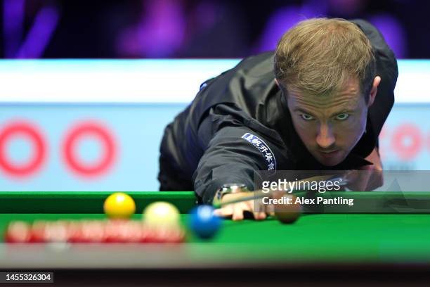 Jack Lisowski of England plays a shot during their first round match against John Higgins of Scotland at Alexandra Palace on January 09, 2023 in...