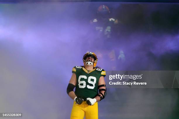 David Bakhtiari of the Green Bay Packers takes the field for player introductions prior to a game against the Detroit Lions at Lambeau Field on...