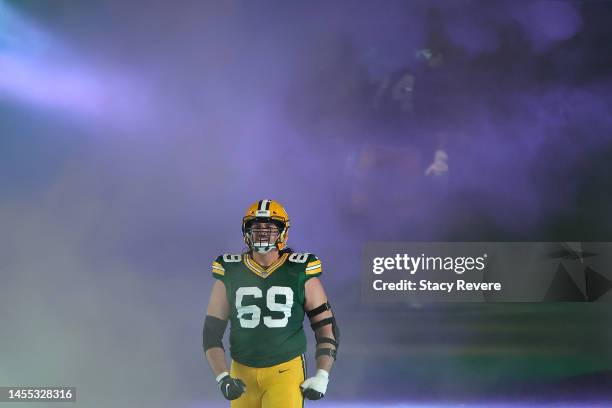 David Bakhtiari of the Green Bay Packers takes the field for player introductions prior to a game against the Detroit Lions at Lambeau Field on...