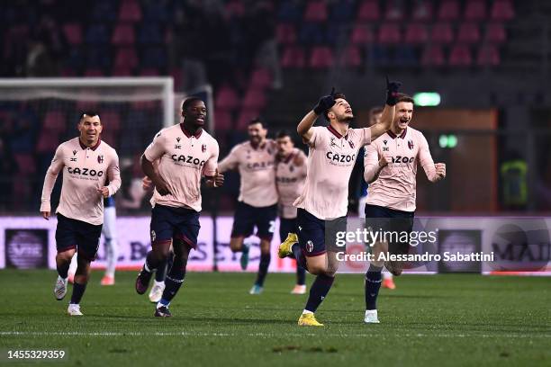 Riccardo Orsolini of Bologna FC celebrates with teammates after scoring the team's first goal during the Serie A match between Bologna FC and...