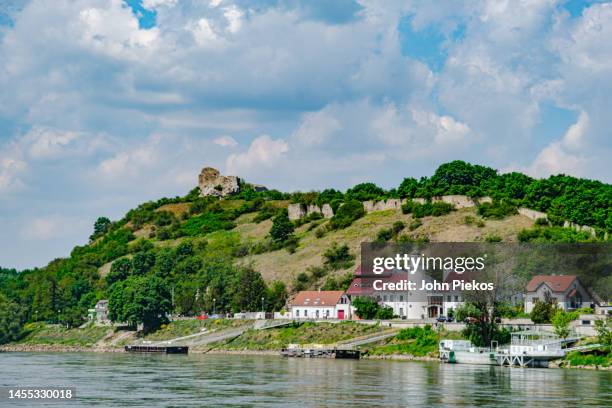 view of the ruins of devin castle, bratislava, slovakia, from a danube river cruise ship. on may 10, 2022 - slovakia town stock pictures, royalty-free photos & images