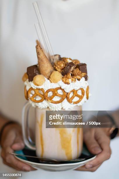 midsection of woman holding ice cream in plate,piazza di spagna,italy - salted brownie stock pictures, royalty-free photos & images