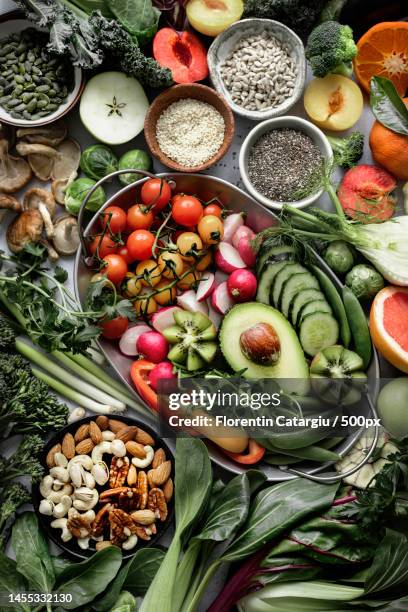 fresh vegetables with mixed nuts flat lay healthy lifestyle,romania - fibre food stockfoto's en -beelden