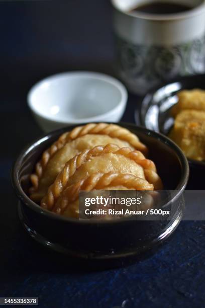 close-up of food in bowl on table,west kalimantan,indonesia - lancashire hotpot stock pictures, royalty-free photos & images