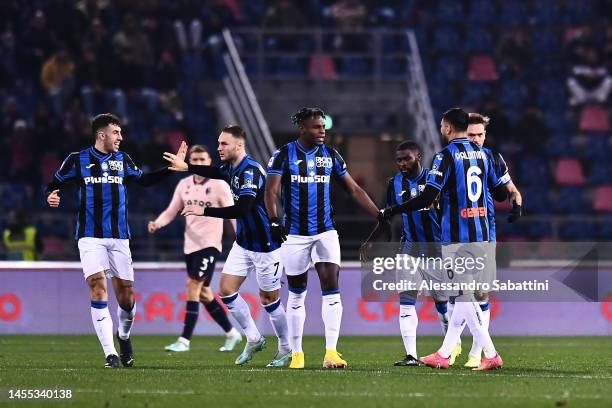 Teun Koopmeiners of Atalanta BC celebrates with teammates after scoring the team's first goal during the Serie A match between Bologna FC and...