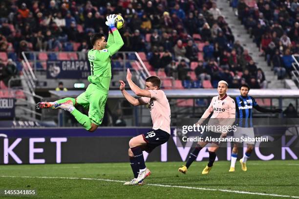 Juan Musso of Atalanta BC saves a shot from Lewis Ferguson of Bologna FC during the Serie A match between Bologna FC and Atalanta BC at Stadio Renato...