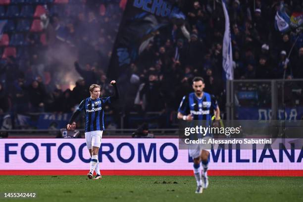 Rasmus Hojlund of Atalanta BC, left, celebrates after scoring the team's second goal during the Serie A match between Bologna FC and Atalanta BC at...