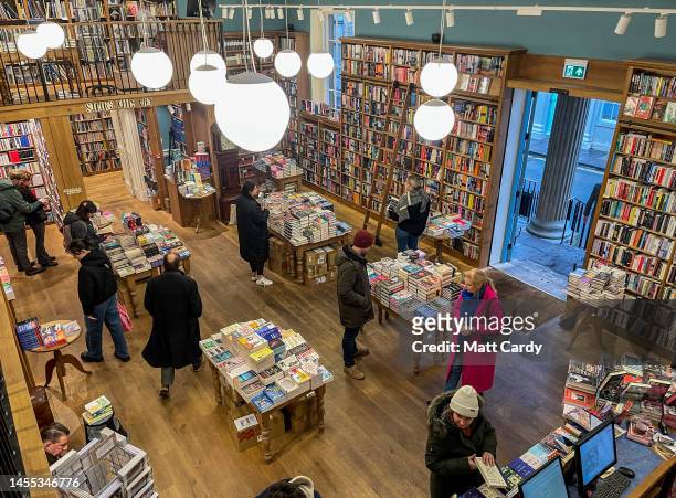 People browse books for sale in a independent bookshop on January 08, 2022 in Bath, England. Due in part to lifestyle changes brought about by the...