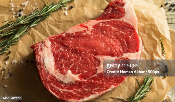 high angle view of meat and herbs on table,pakistan - chuck stock pictures, royalty-free photos & images