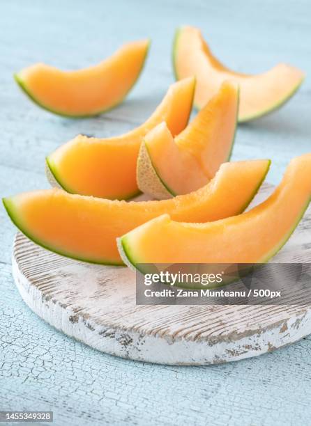 cross section of cantaloupe melon flat lay,romania - cucumis melo stock pictures, royalty-free photos & images