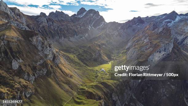 scenic view of mountains against sky,appenzell,switzerland - florian schweizer stock-fotos und bilder