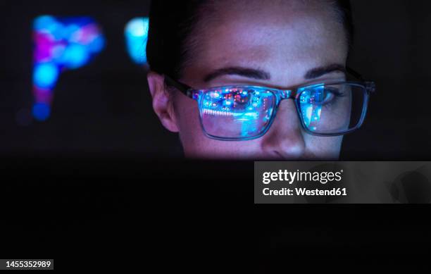 engineer designing ai technology with reflection on eyeglasses - ai big data stockfoto's en -beelden