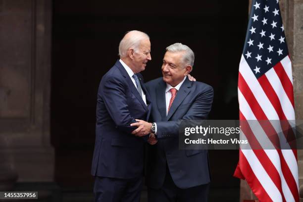 President Joe Biden and President of Mexico Andres Manuel Lopez Obrador shake hands during a welcome ceremony as part of the '2023 North American...