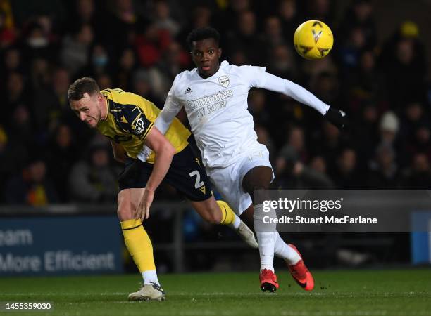 Eddie Nketiah of Arsenal takes on Sam Long of Oxford during the Emirates FA Cup Third Round match between Oxford United and Arsenal at Kassam Stadium...