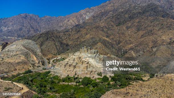 saudi arabia, al makhwah, zee ain, aerial view of ancient village built on summit of white mountain - saudi arabia national day stock pictures, royalty-free photos & images