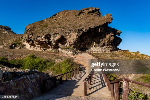 oman, dhofar, salalah, steps and footpath leading to marneef cave - salalah stock pictures, royalty-free photos & images
