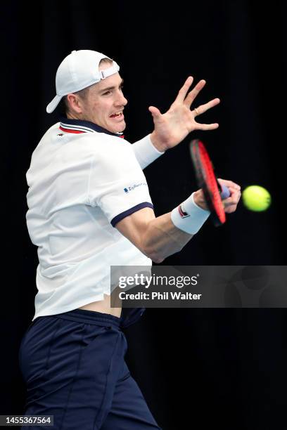 John Isner of the USA plays a forehand during his singles match against Gregoire Barrere of France during day two of the 2023 ASB Classic Men's at...