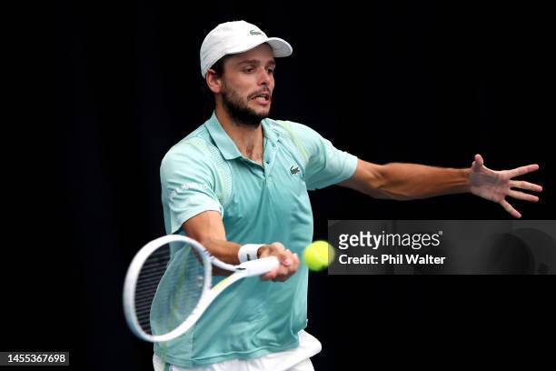 Gregoire Barrere of France plays a forehand during his singles match against John Isner of the USA on day two of the 2023 ASB Classic Men's at the...