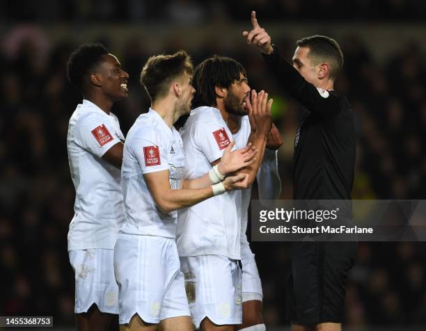 Arsenal's Sambi, Kieran Tierney and Mo Elneny appeal to referee David Coote during the Emirates FA Cup Third Round match between Oxford United and...
