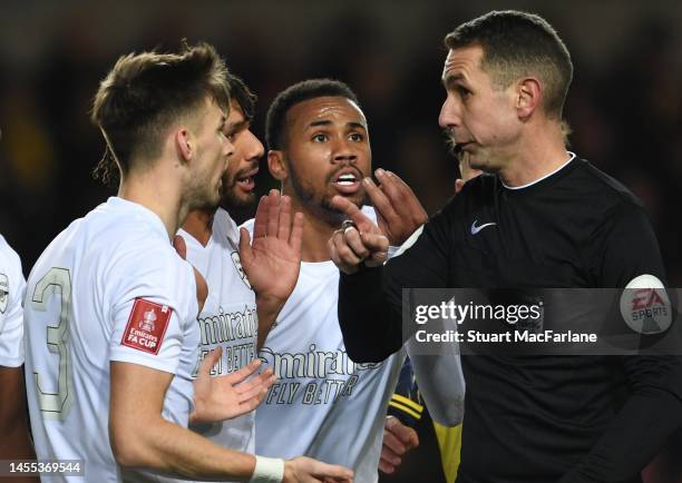 Arsenal's Kieran Tierney, Mo Elneny and Gabriel appeal to referee David Coote during the Emirates FA Cup Third Round match between Oxford United and...