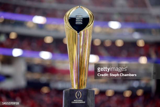 The College Football Playoff National Championship trophy is displayed on the field before the College Football Playoff National Championship game...