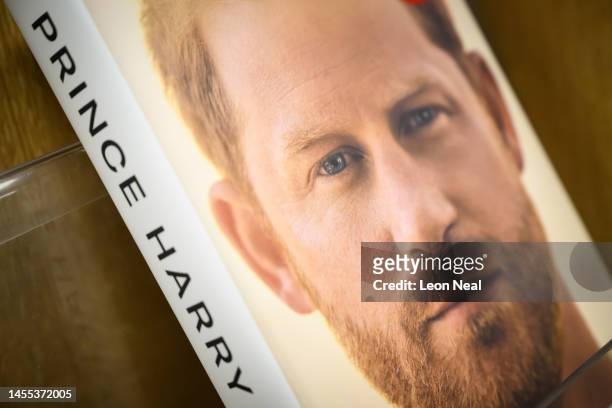 Copies of "Spare" by Prince Harry are seen as they go on sale at one minutes after midnight in WH Smith bookstore at Victoria Station on January 10,...