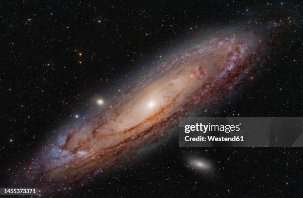 long exposure of andromeda galaxy - galaxie photos et images de collection