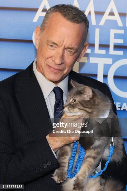 Tom Hanks and Smeagol the cat attend the "A Man Called Otto" New York Screening at Dot Dash Meredith on January 09, 2023 in New York City.