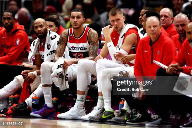 Kyle Kuzma of the Washington Wizards looks on from the bench after being called for a technical foul in the first half against the New Orleans...