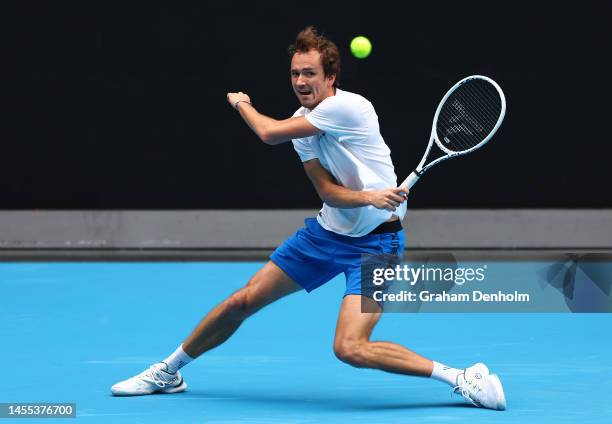 Daniil Medvedev of Russia plays a forehand during a practice session ahead of the 2023 Australian Open at Melbourne Park on January 10, 2023 in...